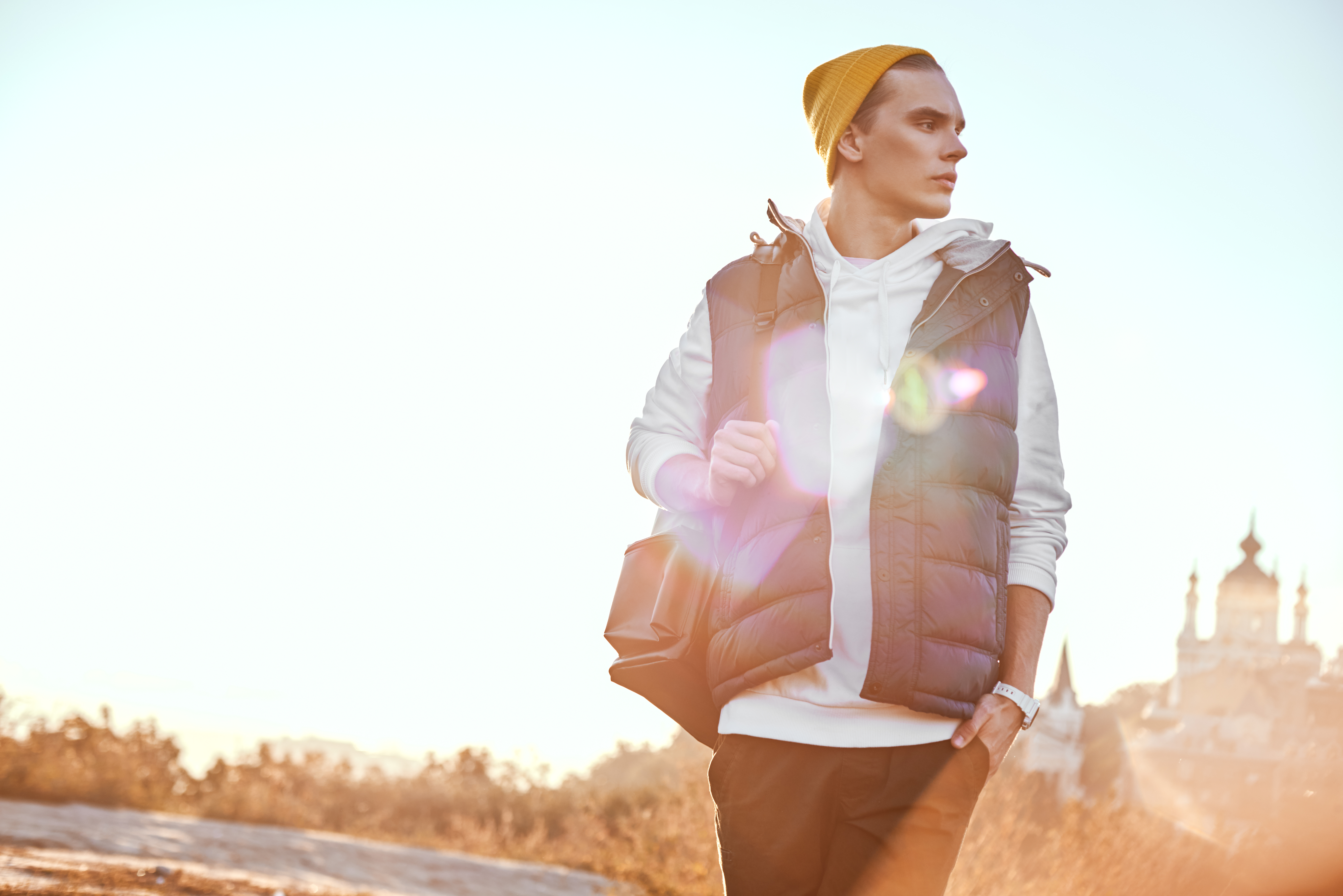 Jacket worn open over hoodie