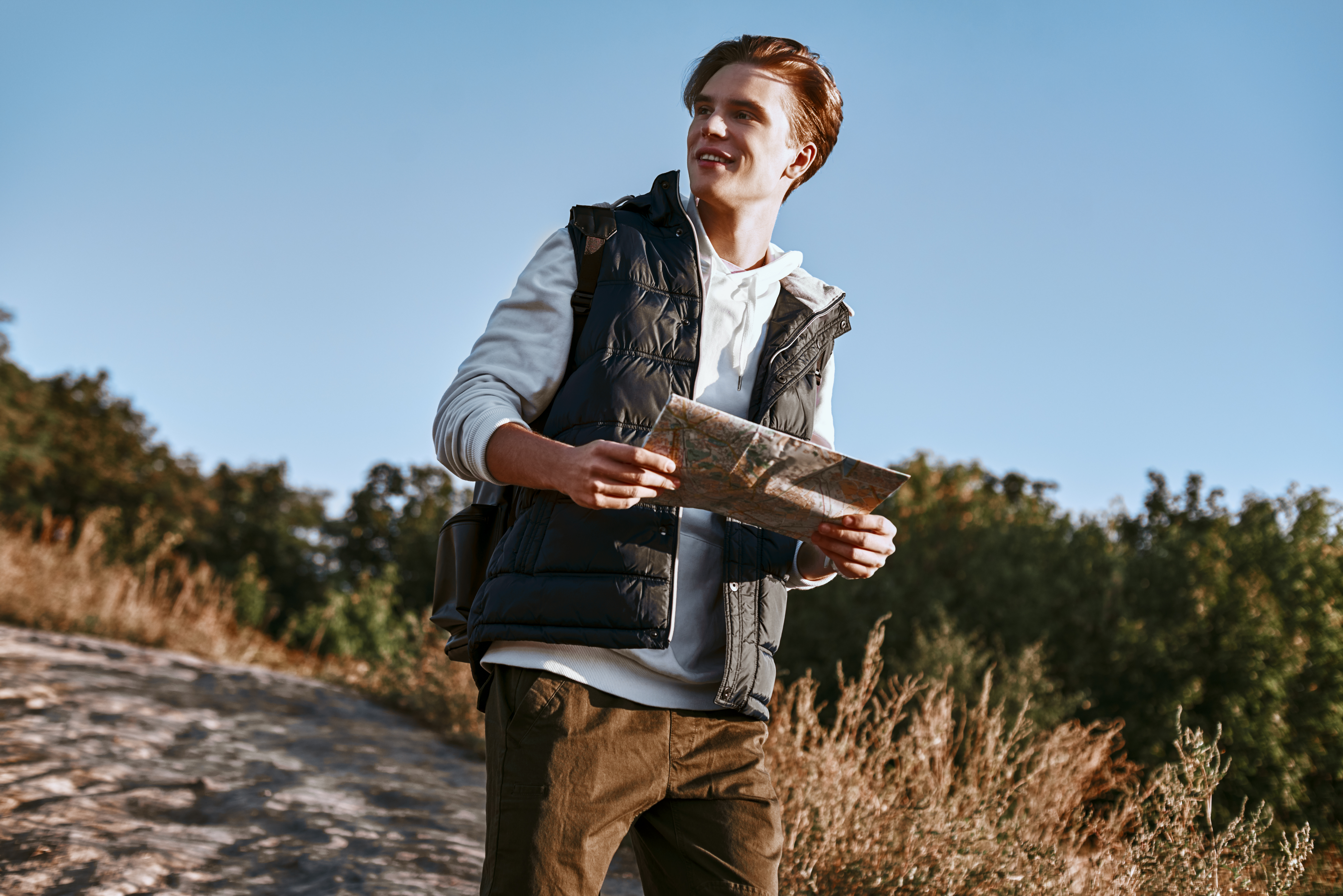 Man wearing a quilted lightweight vest over a work shirt